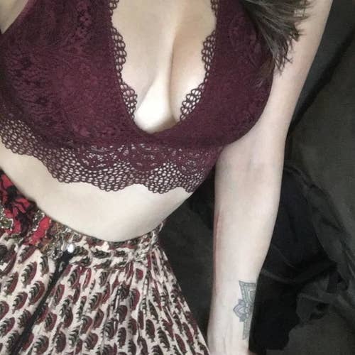 Reviewer wearing the red bralette