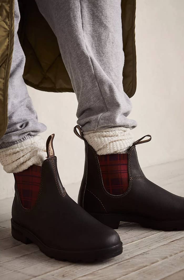 The dark brown boots with red plaid cut-out