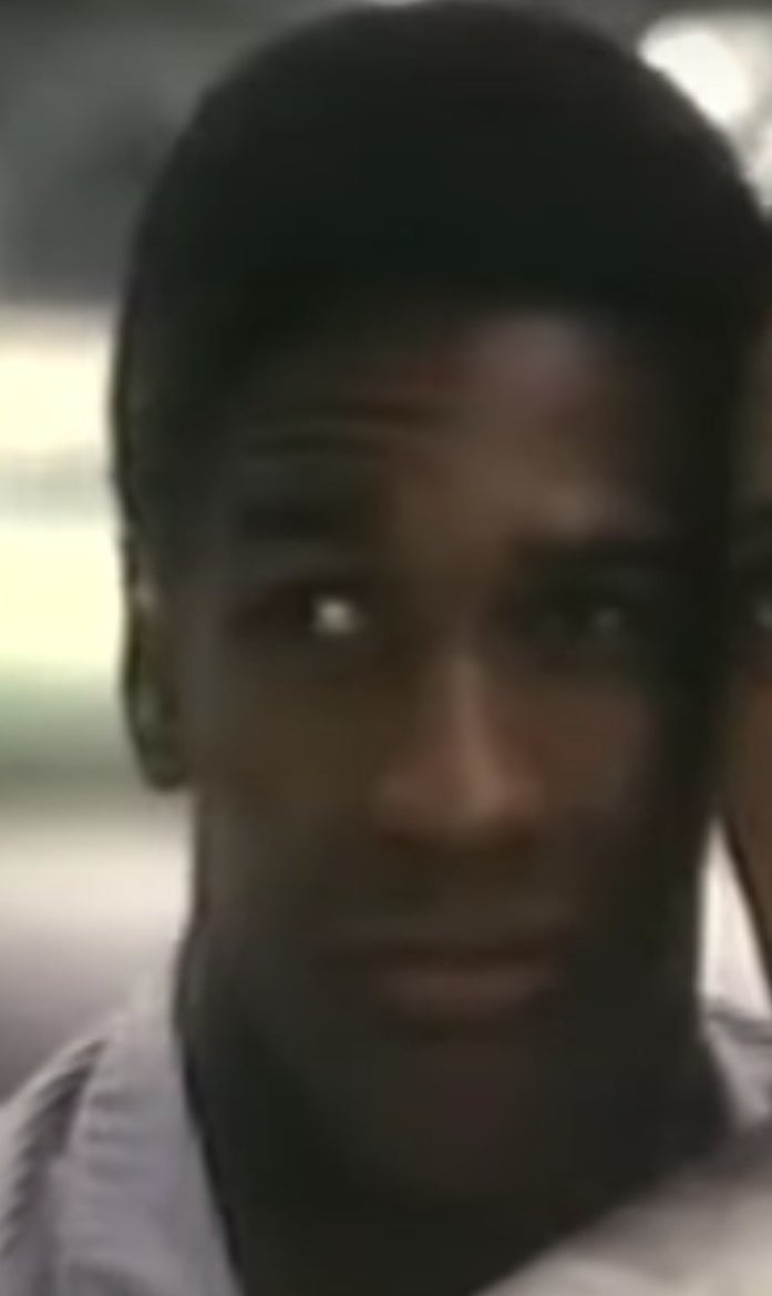 Denzel Washington as Robert sits in a park in &quot;Wilma&quot;