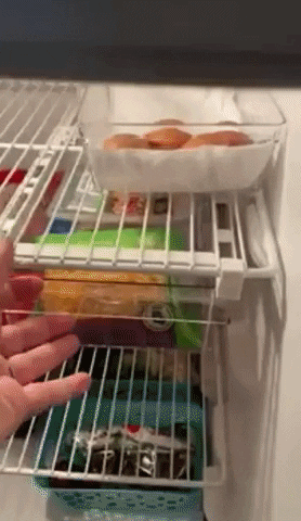 a reviewer opening   the drawer successful  the fridge