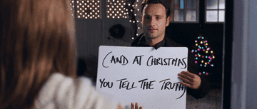 Andrew Lincoln holding up the &quot;to me you are perfect&quot; sign in Love Actually