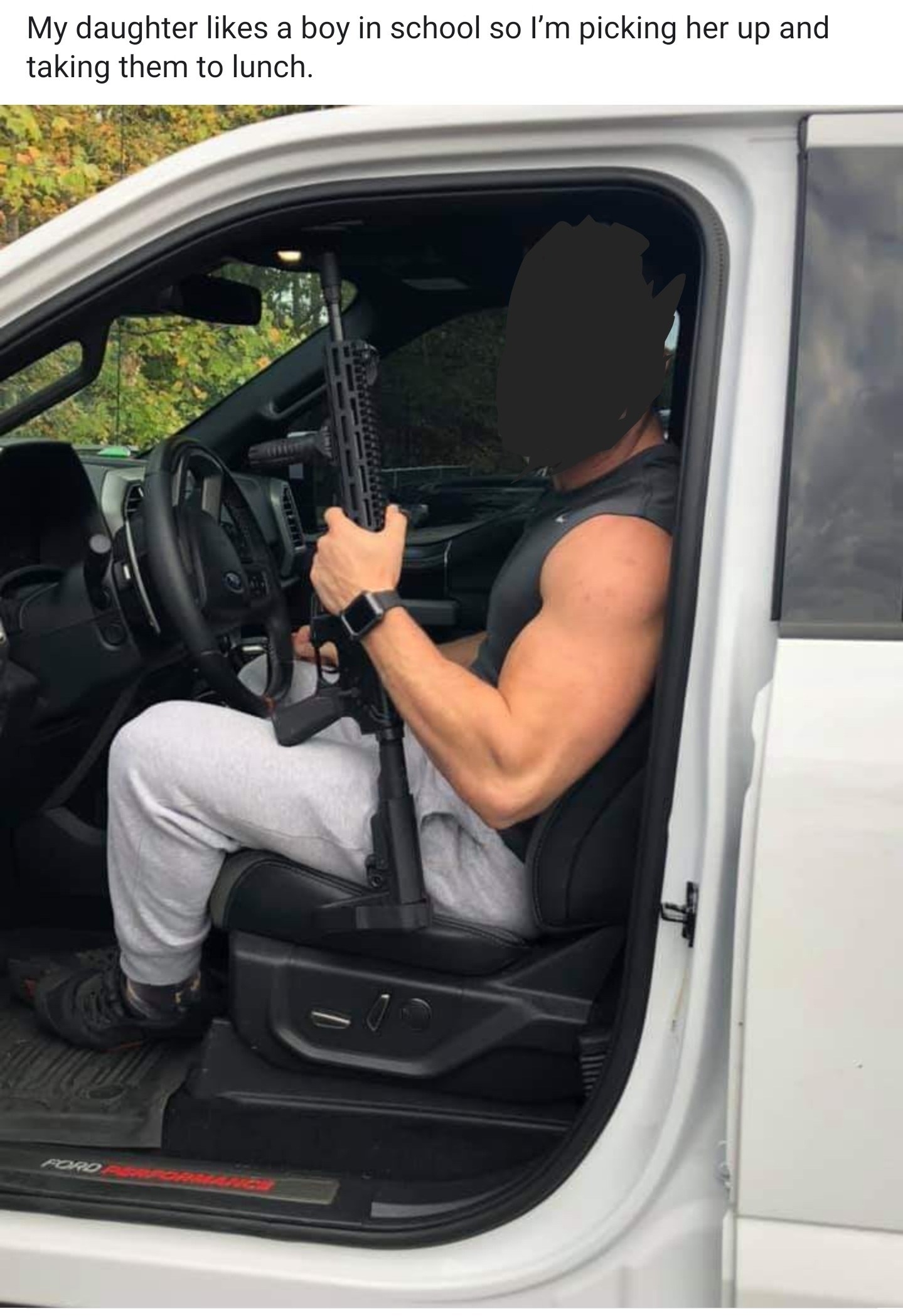 A man holding a shotgun while sitting in his truck with a caption saying his daughter likes a boy in her school so he&#x27;s picking them up for lunch