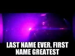 Bright pink and purple lights with text that reads &quot;last name ever, first name greatest&quot;