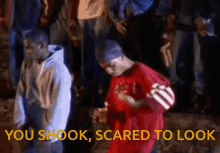 Mobb Deep in the music video with text that says, &quot;You shook, scared to look&quot;