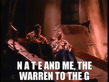Warren G and Nate Dogg in their video with text that reads, &quot;N a t e and me, the Warren to the G&quot;
