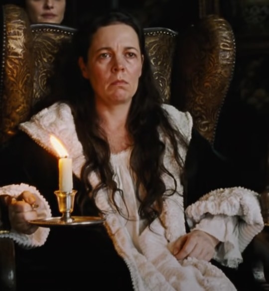 Olivia Colman sits during a scene from &quot;The Favourite&quot;