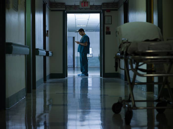 Male doctor in hospital corridor