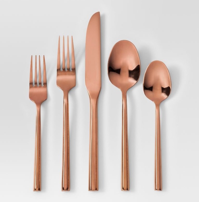 A set of 5 rose gold silverware
