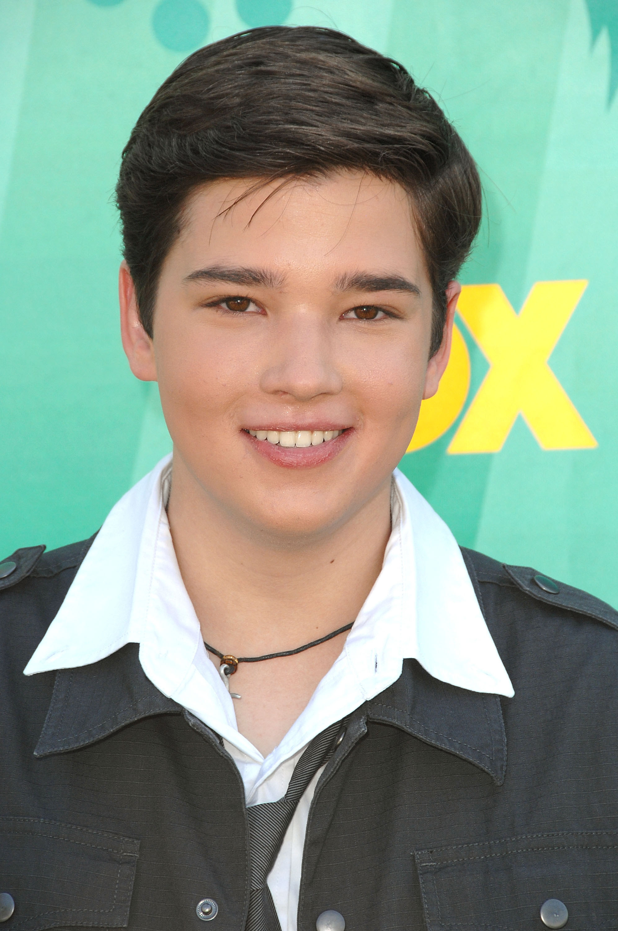 Nathan Kress smiling at an event in 2009