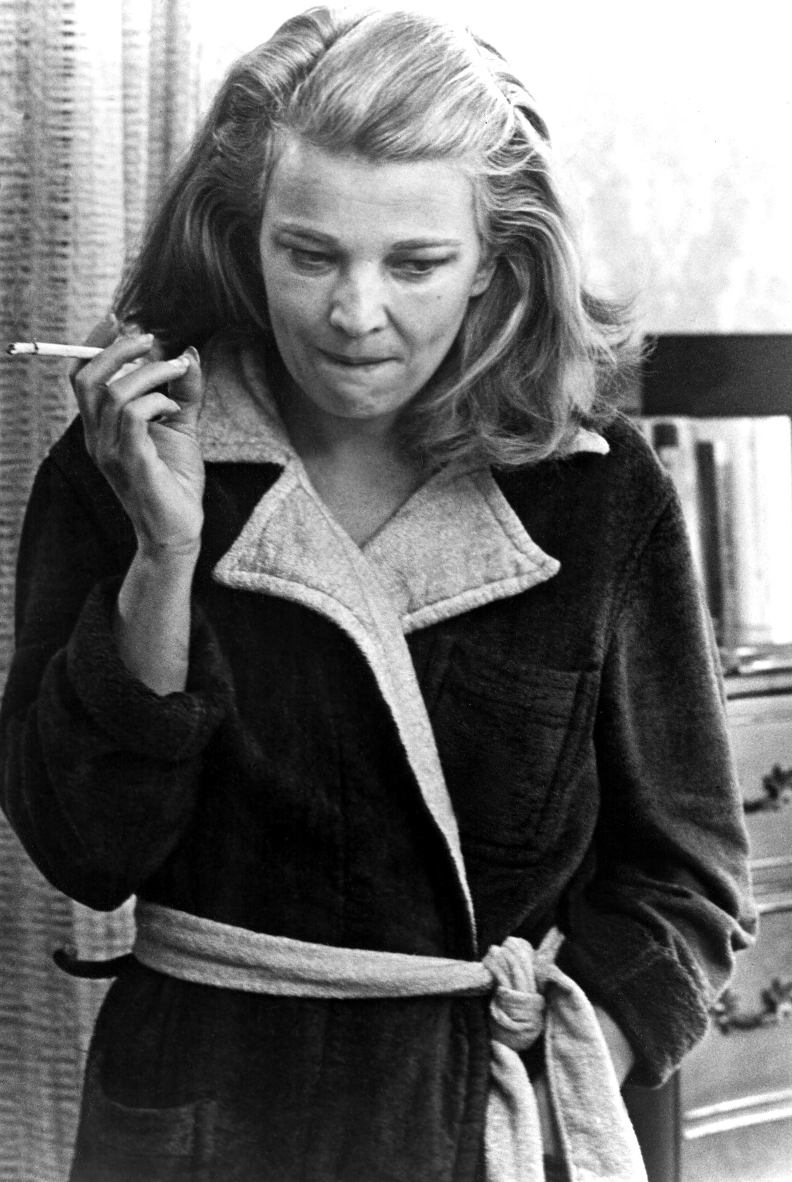 Gena Rowlands smoking a cigarette in the film