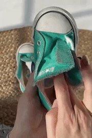 A gif showing how to place the stickers halves inside the shoes