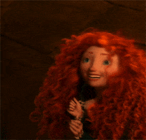 A close up of Merida as she smiles and jumps up and down