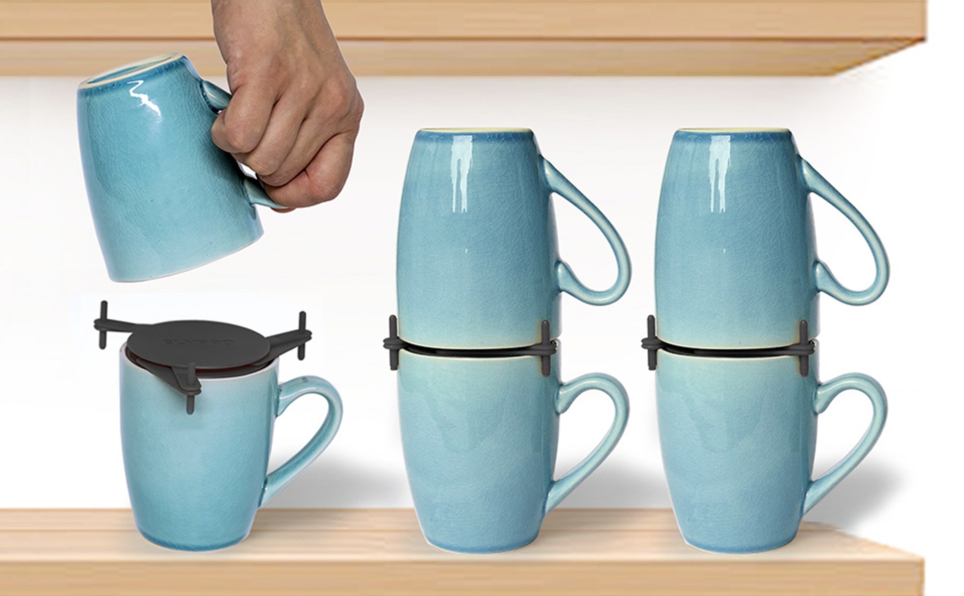 The black organizers being used to stack two mugs on top of each securely