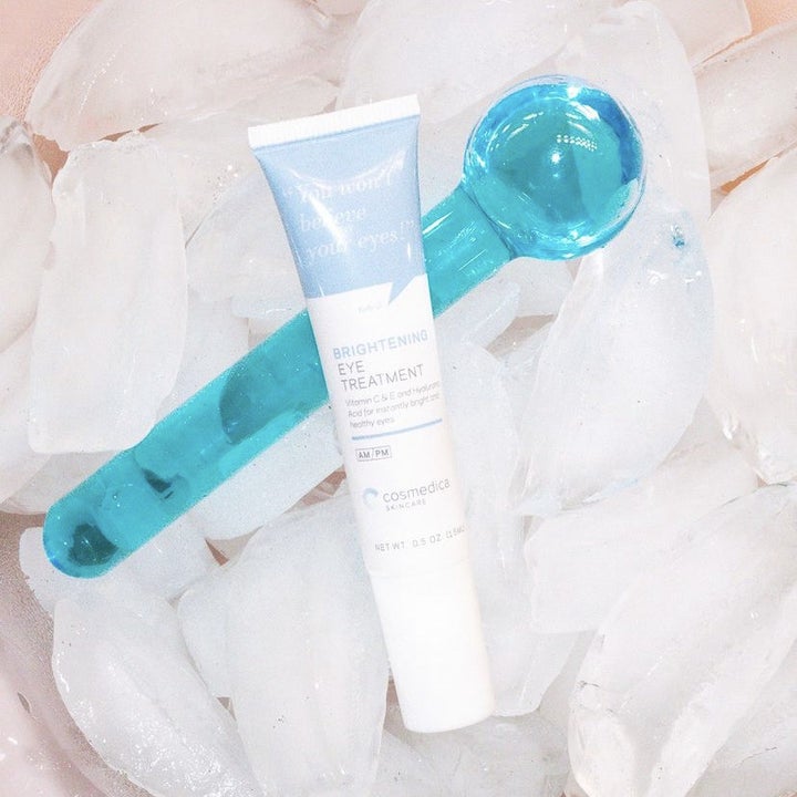 the eye cream and ice globe roller sitting in ice