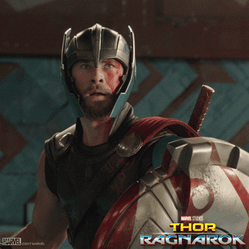 dressed in armor, Thor cheers yes