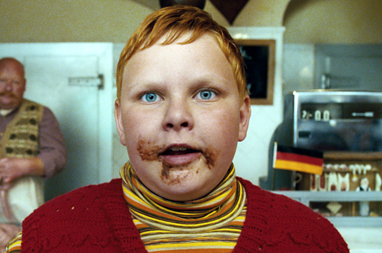 Augustus Gloop from Charlie and the Chocolate Factory with chocolate all over his face