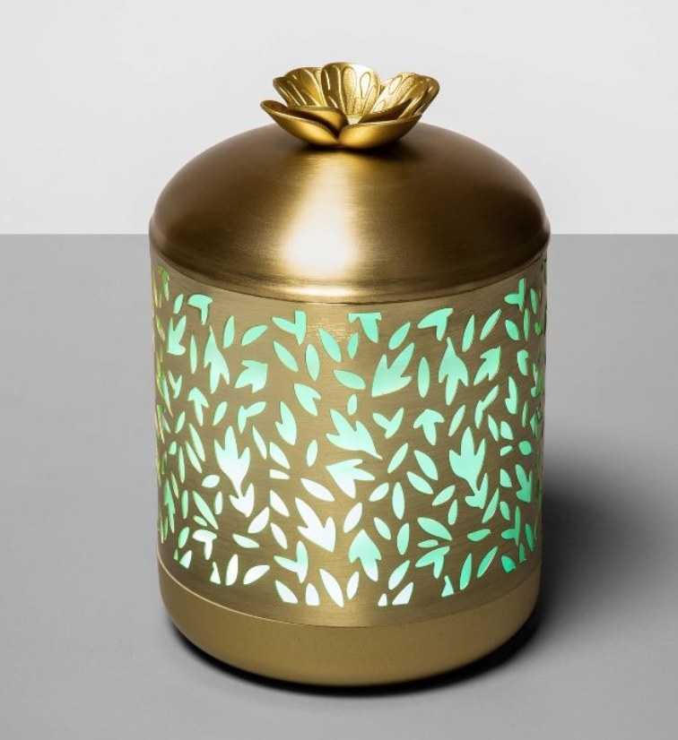 the gold oil diffuser lit up green
