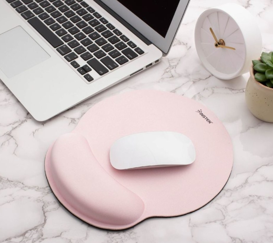 the pink mousepad on a desk