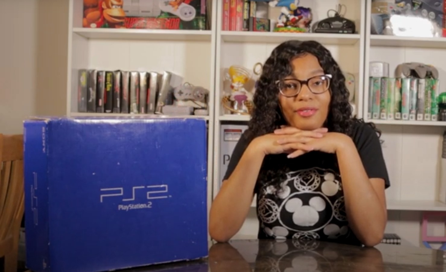 Victoria Brown showing off her PS2 collection