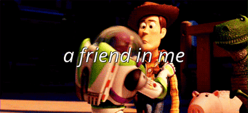 Buzz and Woody hugging in Toy Story