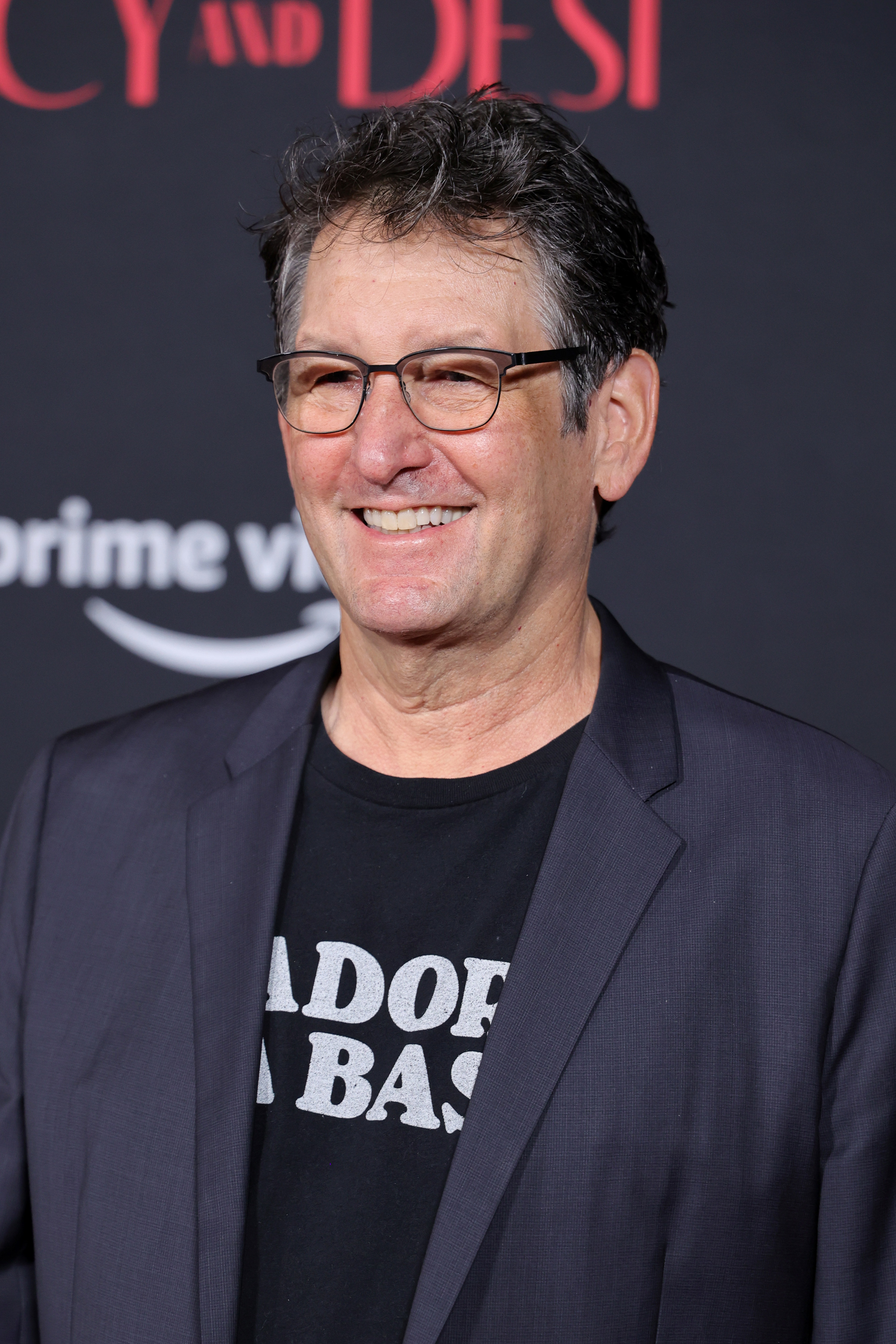 David Schwartz smiles at the &quot;Lucy and Desi&quot; Los Angeles premiere on February 15, 2022