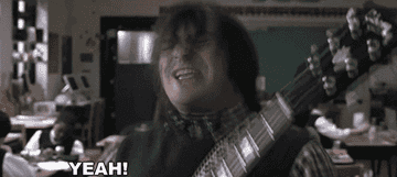 Jack Black as Dewey Finn rocks out on a guitar in the classroom in &quot;The School of Rock&quot;