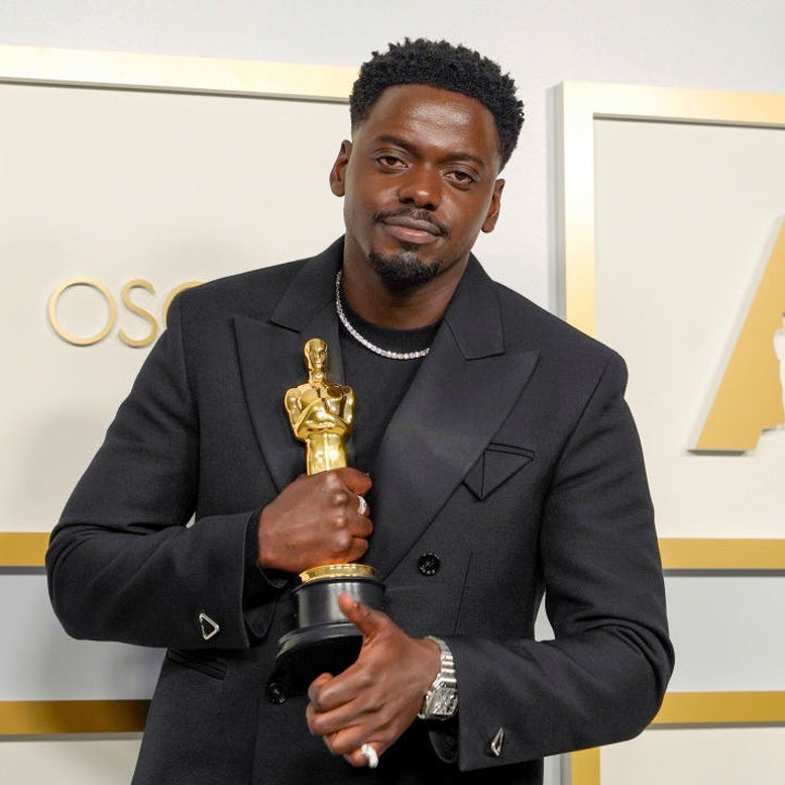 Daniel holding his Oscar