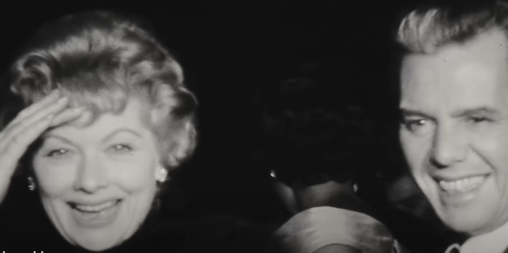 Lucille Ball and Desi Arnaz laugh at an event in the &quot;Lucy and Desi&quot; trailer