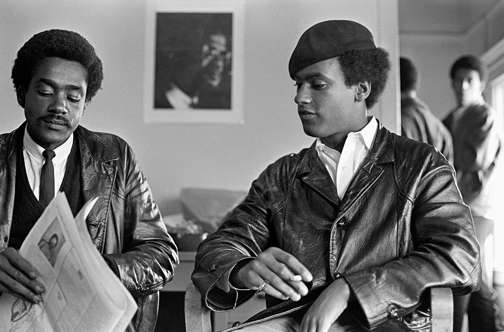 Huey Newton, founder of the Black Panther Party, sits with Bobby Seale at party headquarters in San Francisco.