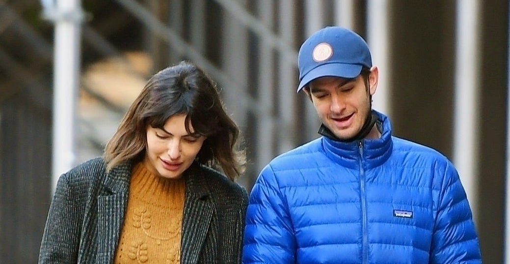 in a closeup, Andrew tilts his head towards Alyssa and talks to her