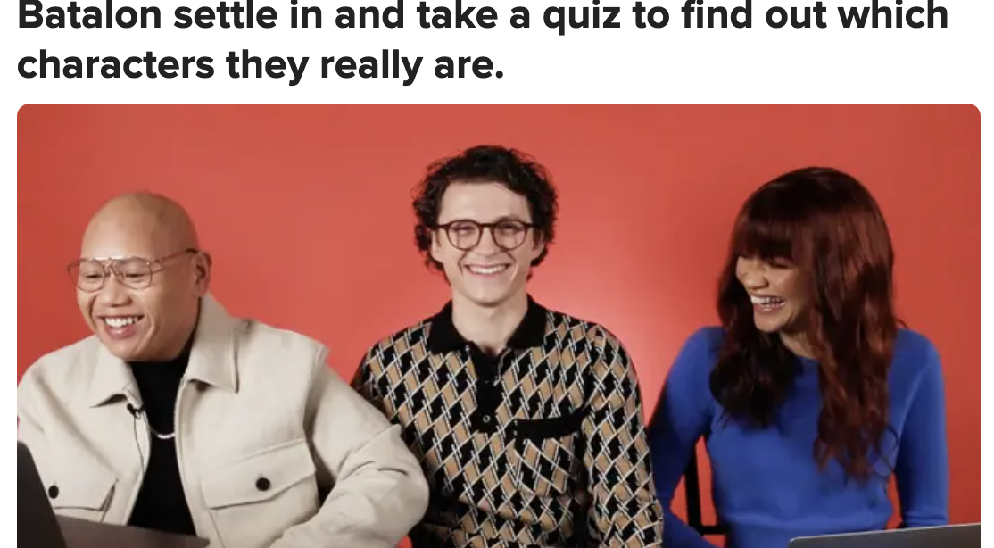 Tom Holland, Jacob Batalon, and Zendaya laughing and taking a quiz