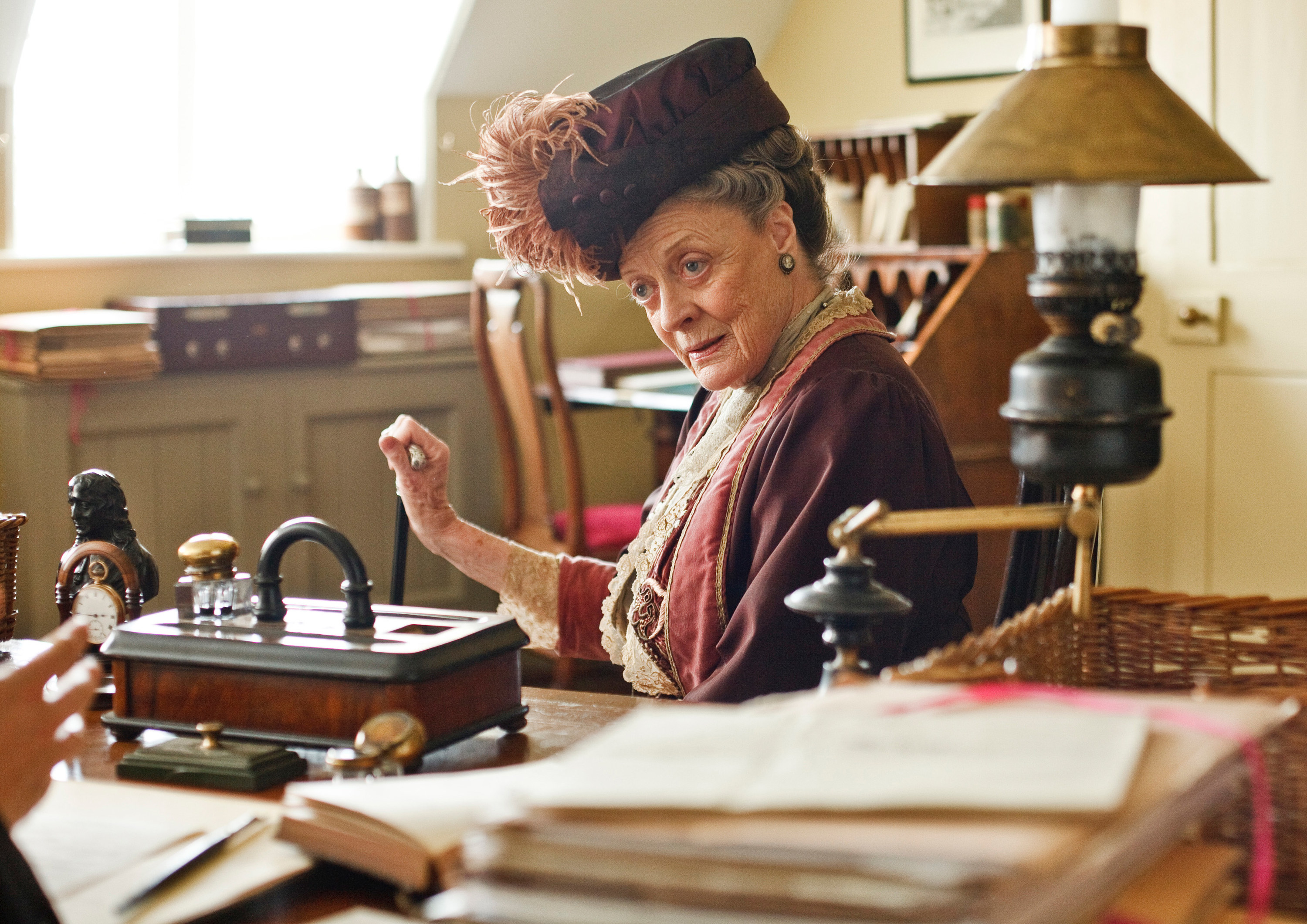 Smith as the countess in an office