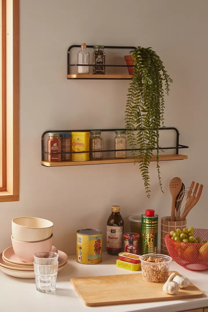 The wall shelves in the sizes Small and Large in the color Black