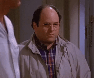 george costanza slowly backing out of a doorway