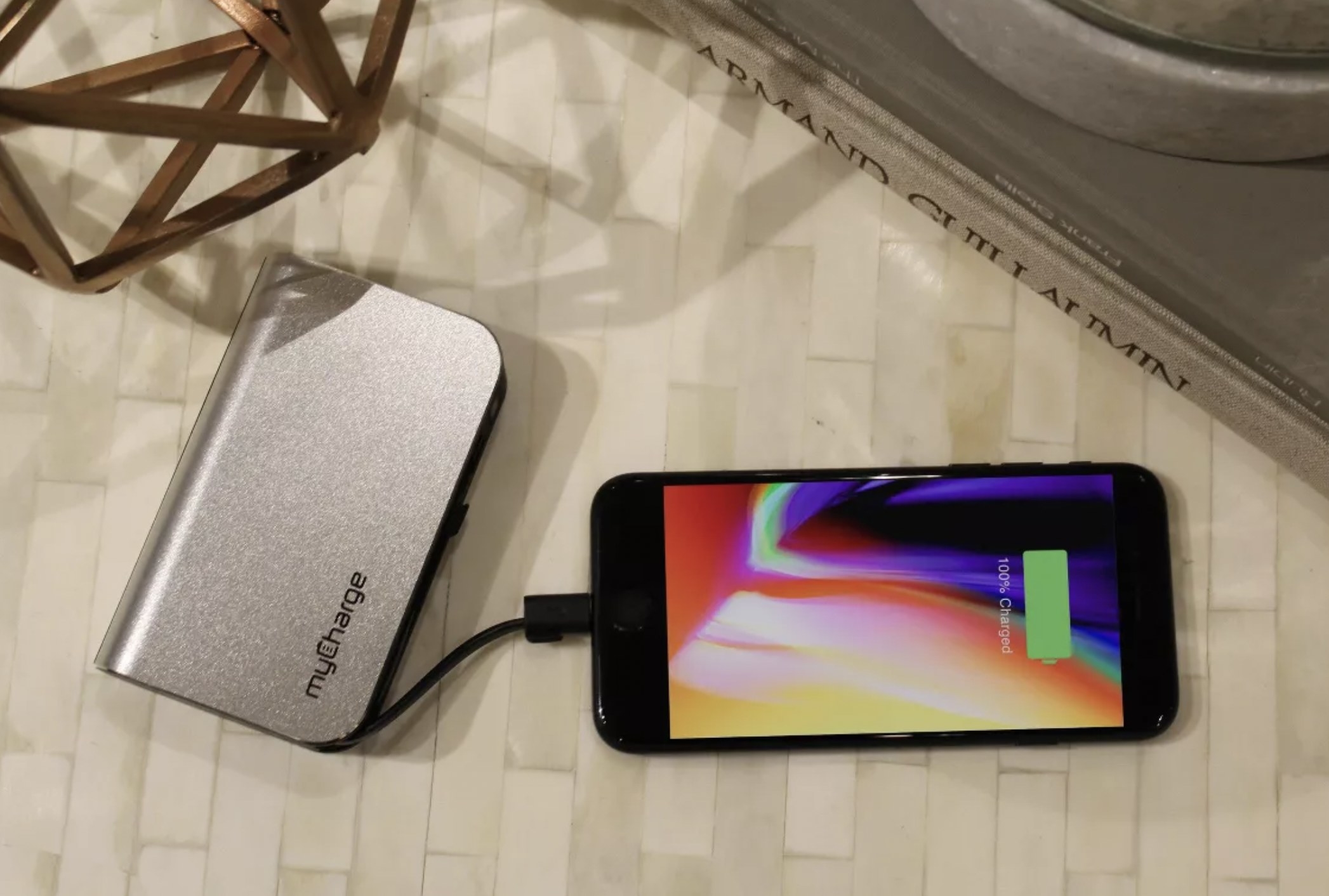 the power bank charging a phone