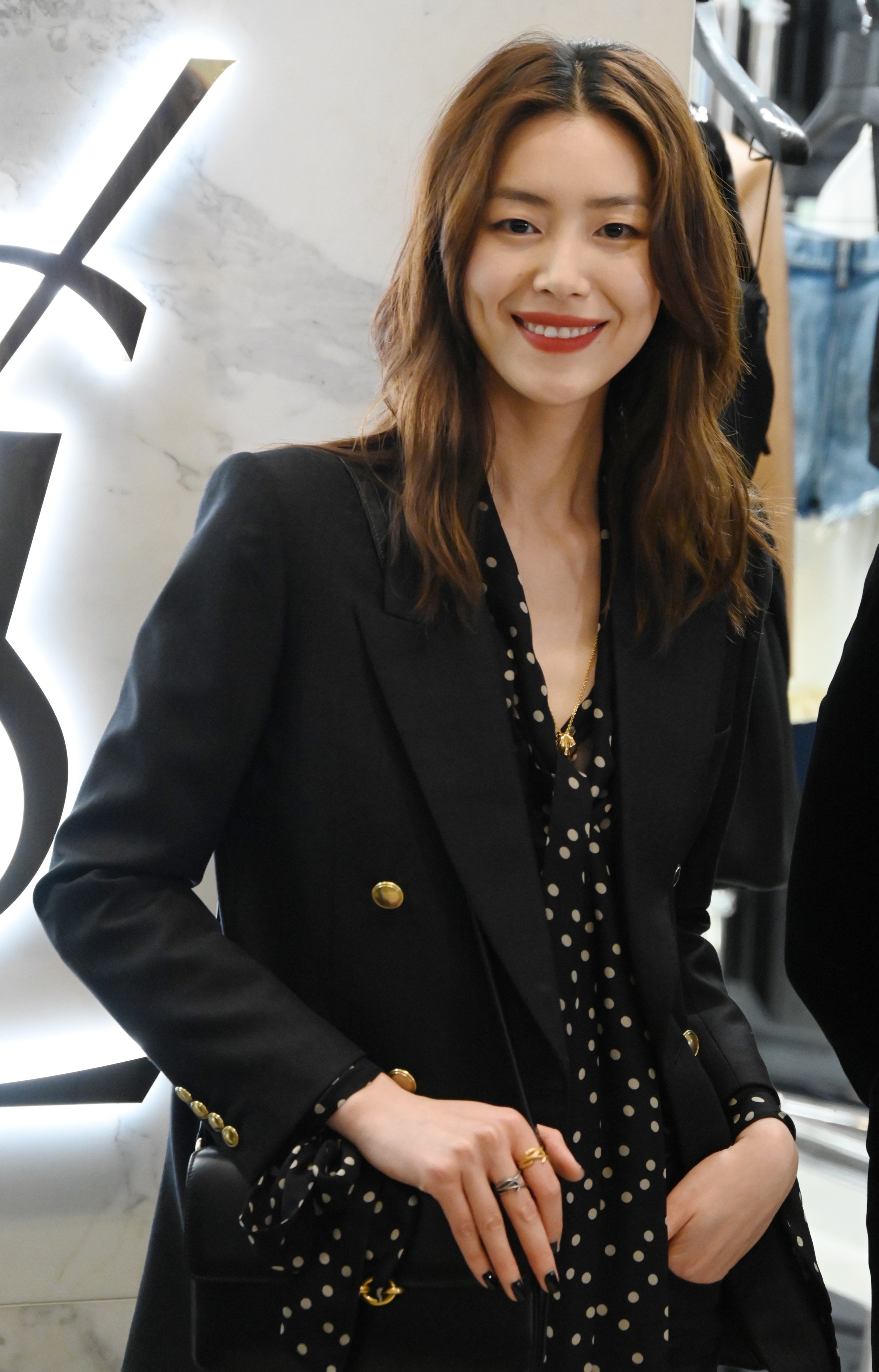 Liu Wen smiles at a YSL promotional event in March 2021