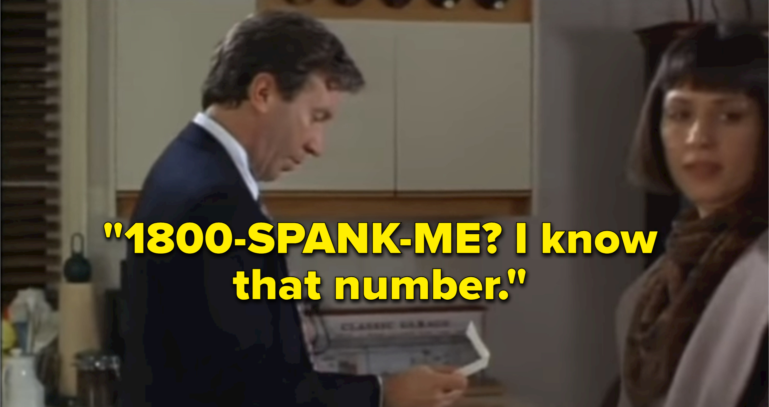 Tim Allen reading a number that says &quot;1800 spank me&quot;