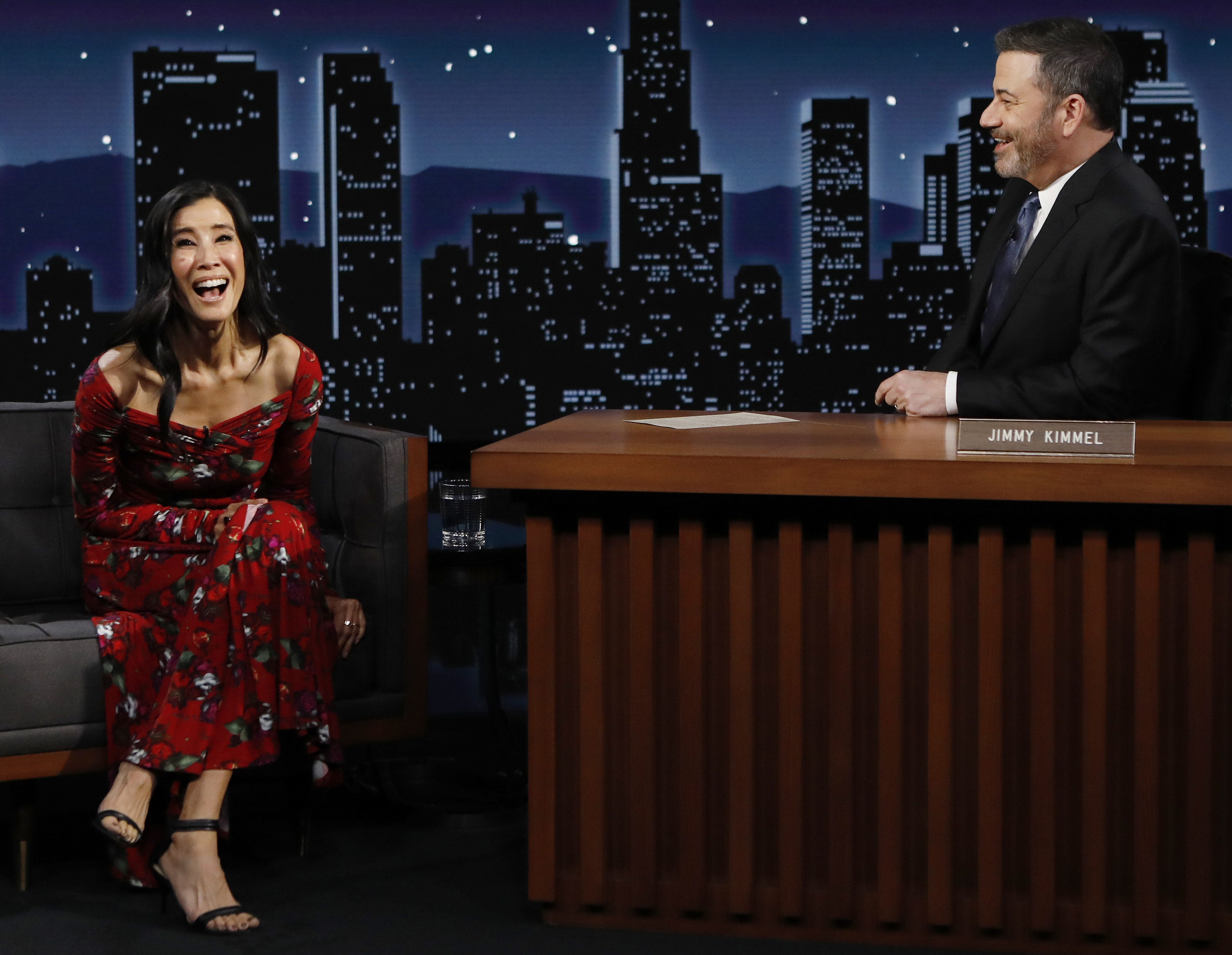 Lisa laughs while sitting next to Jimmy