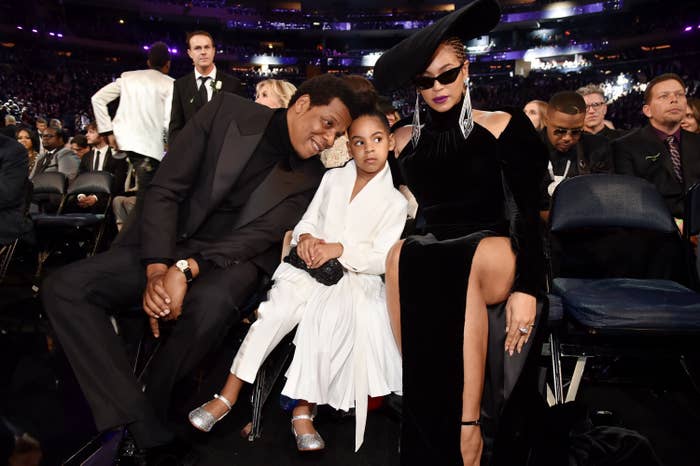 image of beyonce blue ivy and jay z sitting down during an awards show