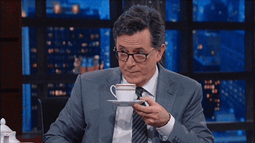 gif of man sipping tea