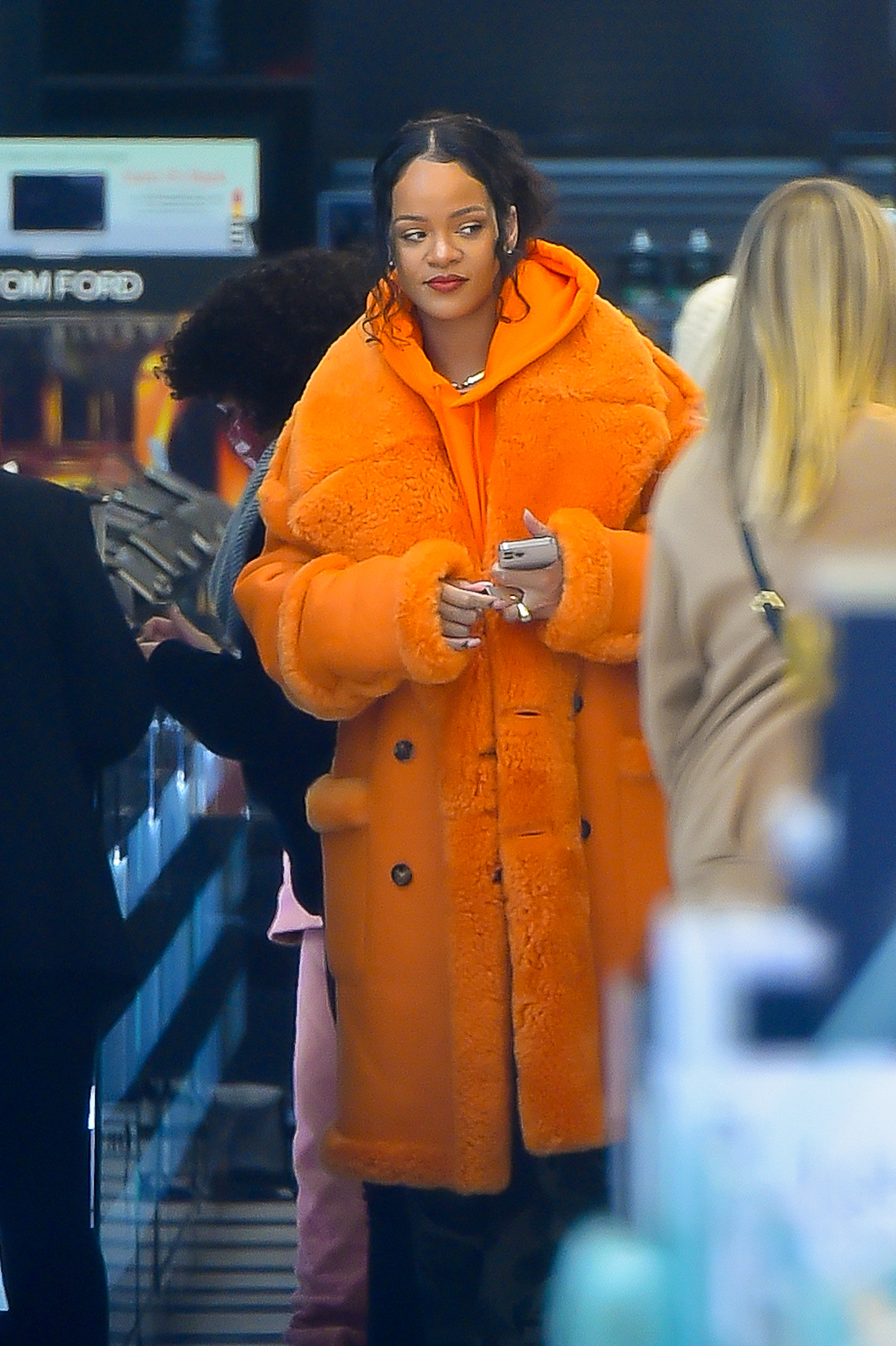 ellie harrison orange coat