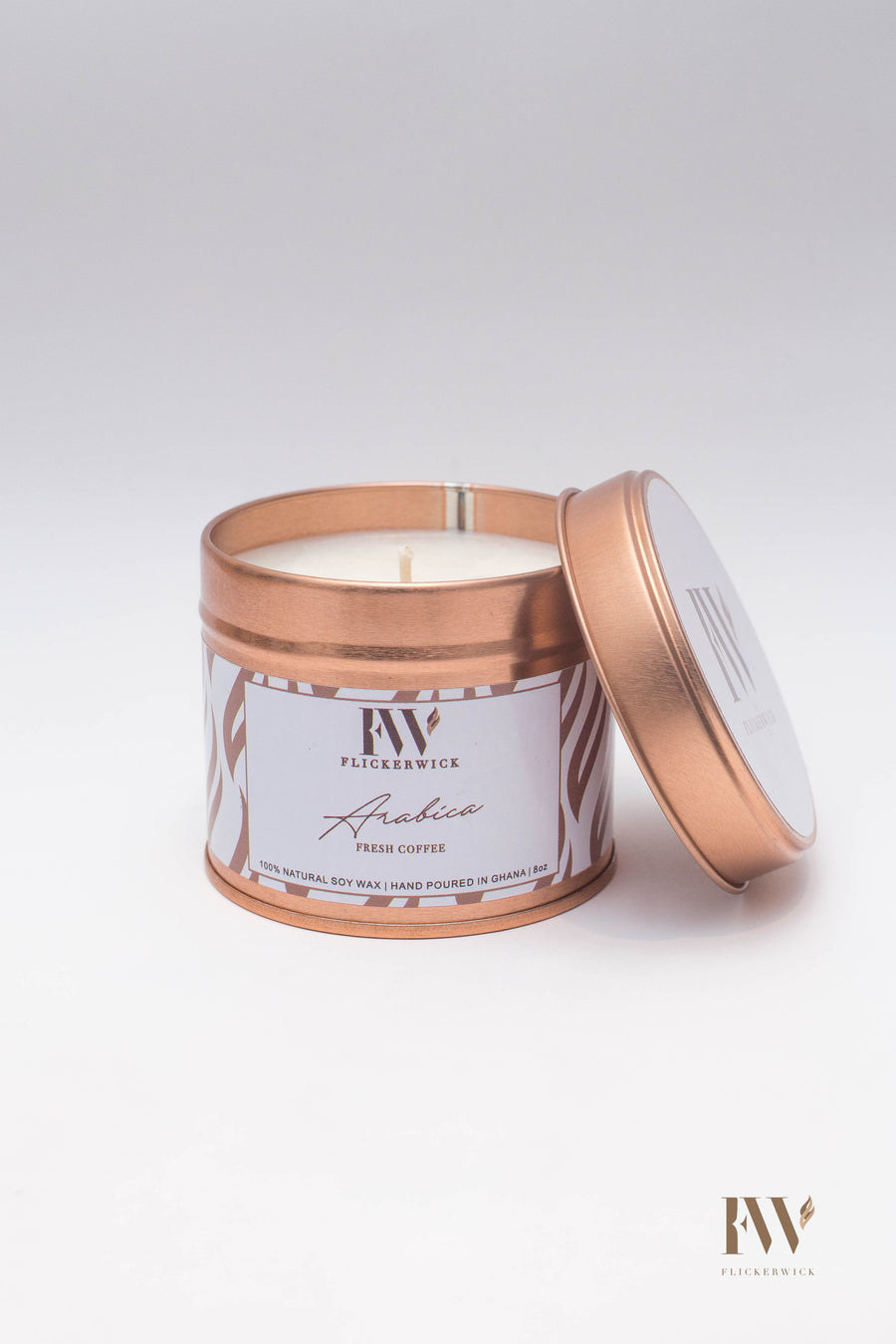 A candle in rose gold packaging from Flickerwick.
