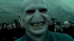 voldemort smiling, showing all teeth