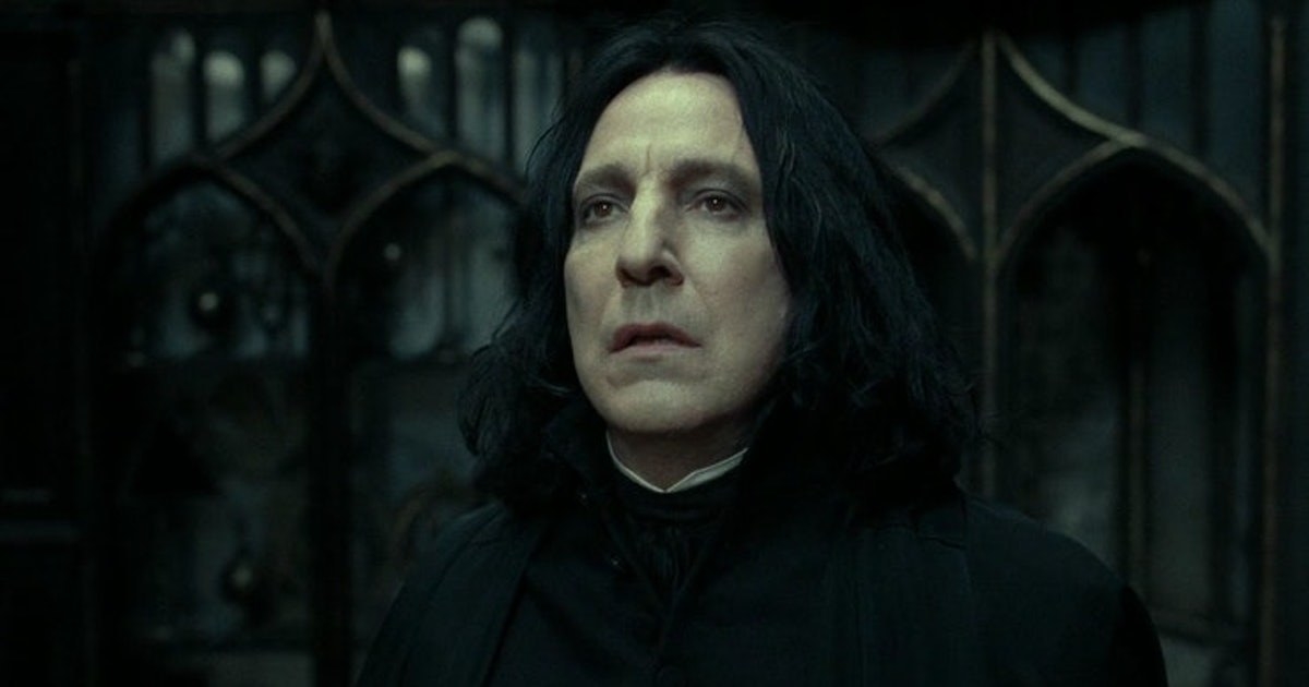 snape wears a dark robe and looks up at the sky