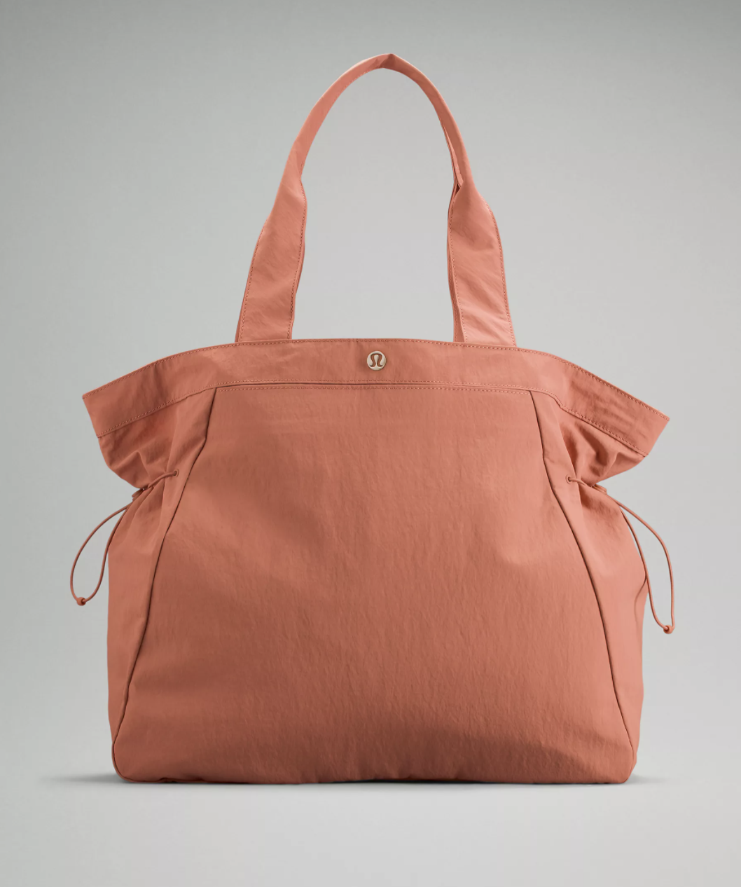 a large tote bag with cinchable sides