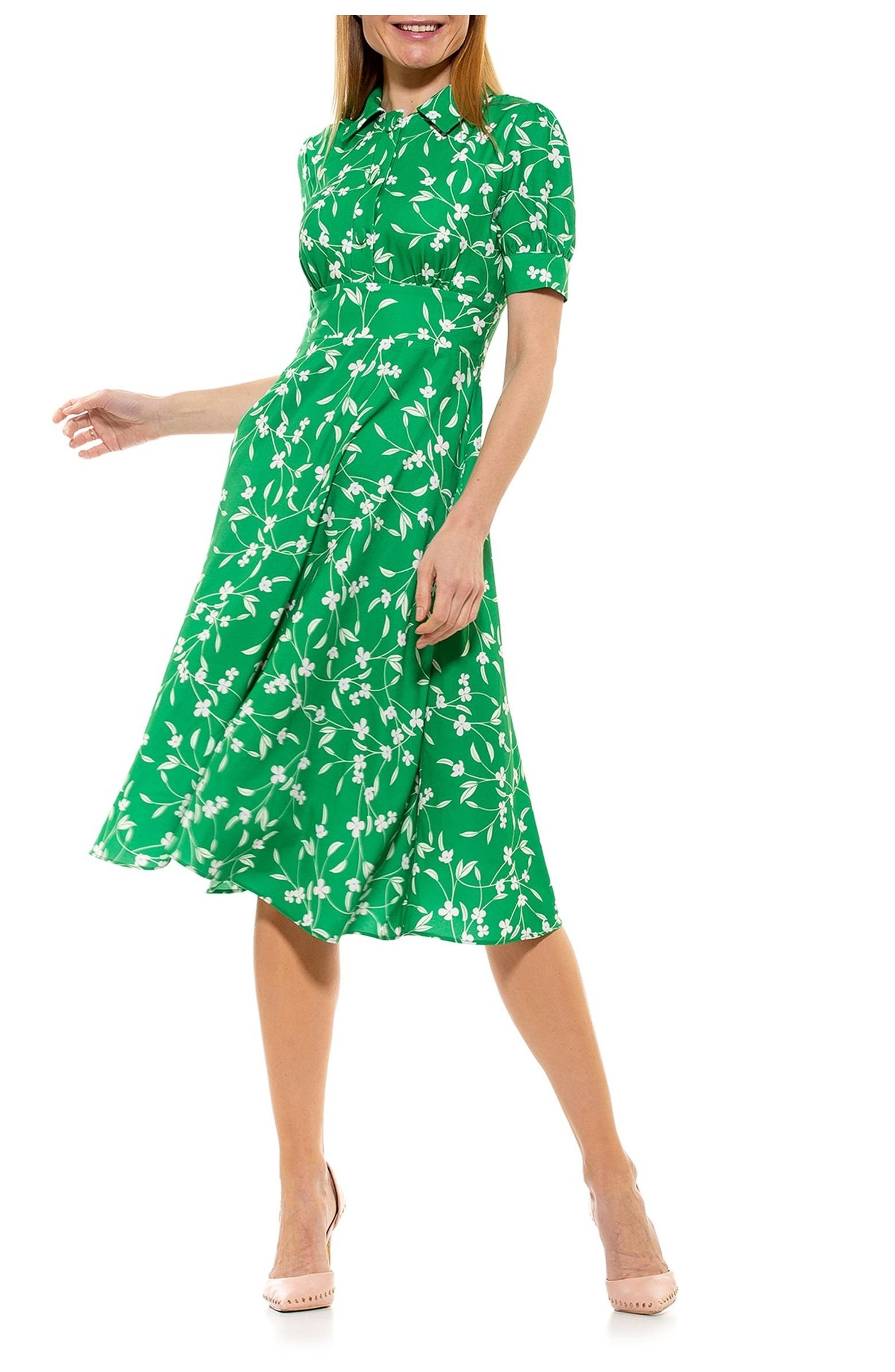 A model wearing the dress in Green Ditzy