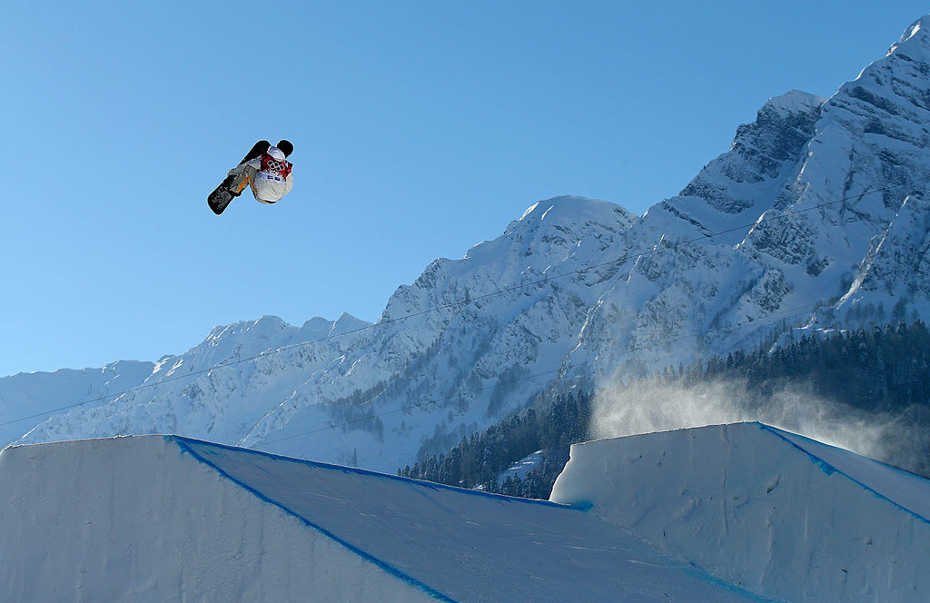 a snowboarder very high in the air