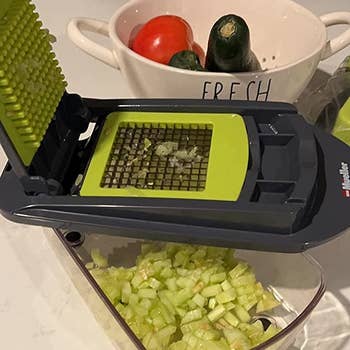 a reviewer's diced celery in the chopping unit