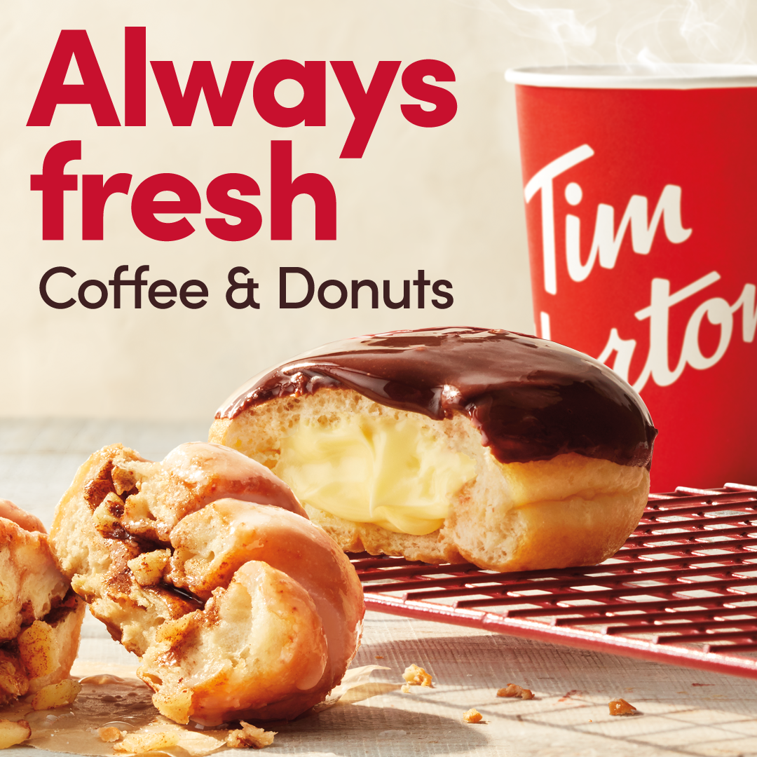 A photo of two donuts on a cream background with a cup of Tim Hortons in the background. Text on the image says &quot;Always Fresh Coffee &amp; Donuts&quot;