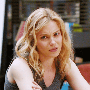 Britta Perry turns and makes a &quot;really&quot; face on Community